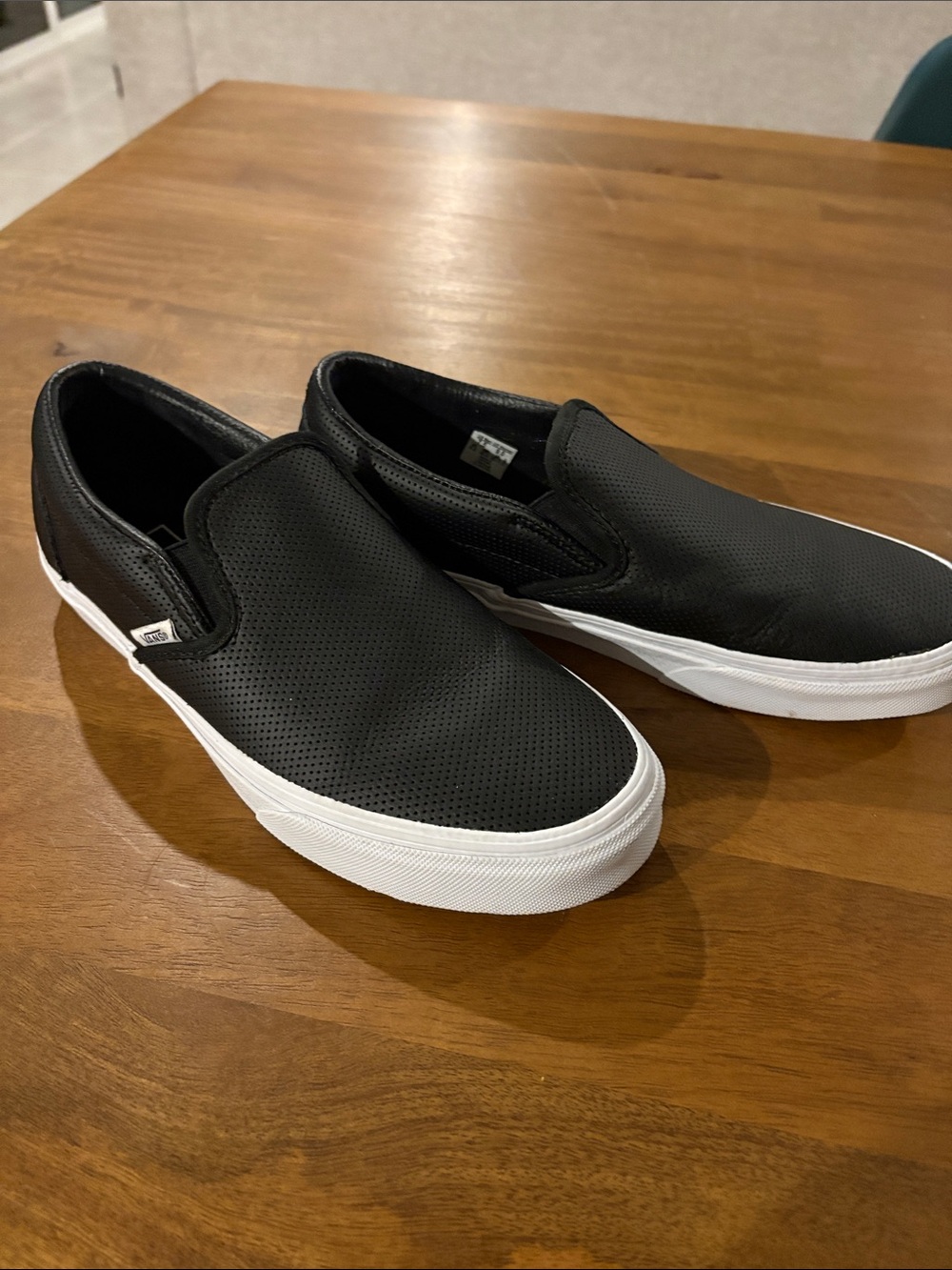 Vans Black Perforated Leather Slip-On Sneakers with White Sole